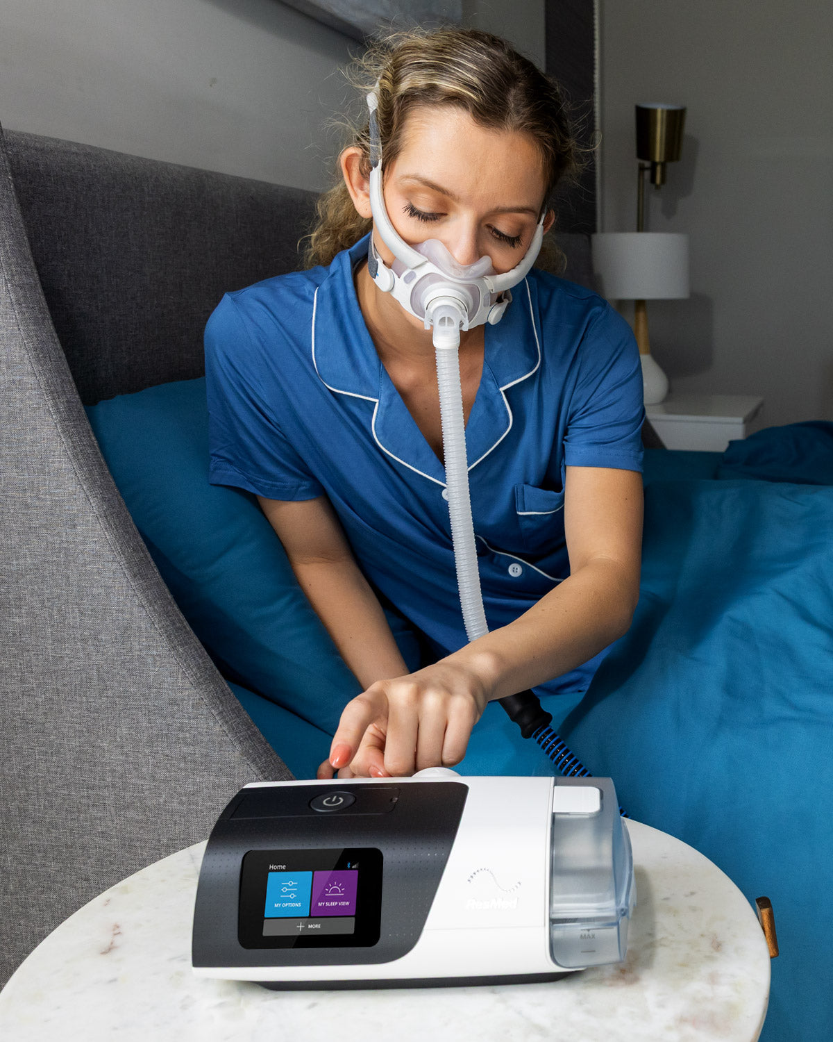 Woman using AirSense 11